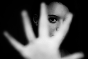 woman signaling halt (B/W)