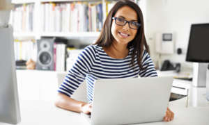 smiling while on computer
