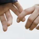 How-to-Let-Go-of-Someone-You-Love couple hands separating